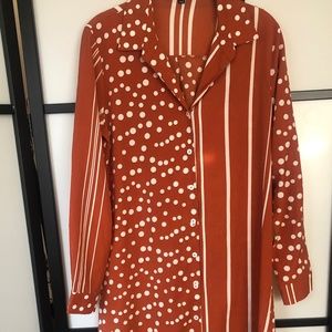 Asymmetrical pattern Lulus midi dress! Burnt orange polka dot and stripes